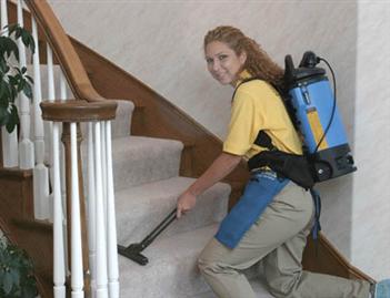Maids Vacuuming Stairs Photo